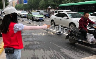 我校开展“绿城红绿灯”党员志愿服务活动